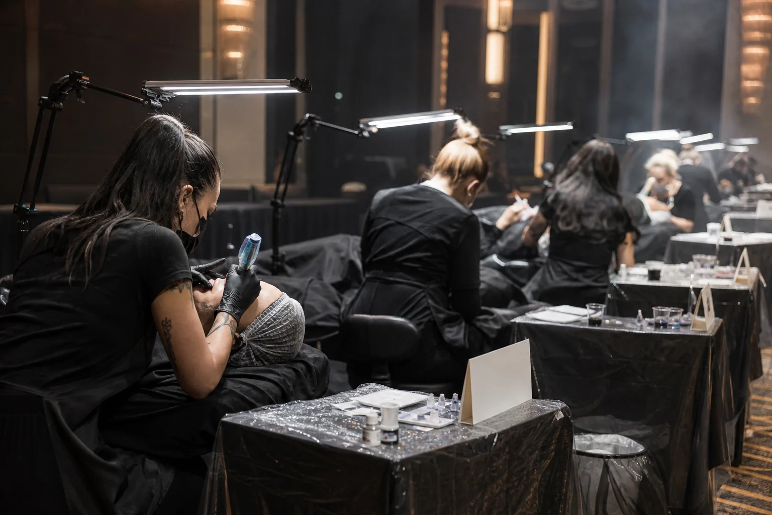 Editorial concept of brow artists working at individual championship stations